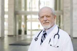 Aged man wearing white lab gown | heathcare_BI_trends